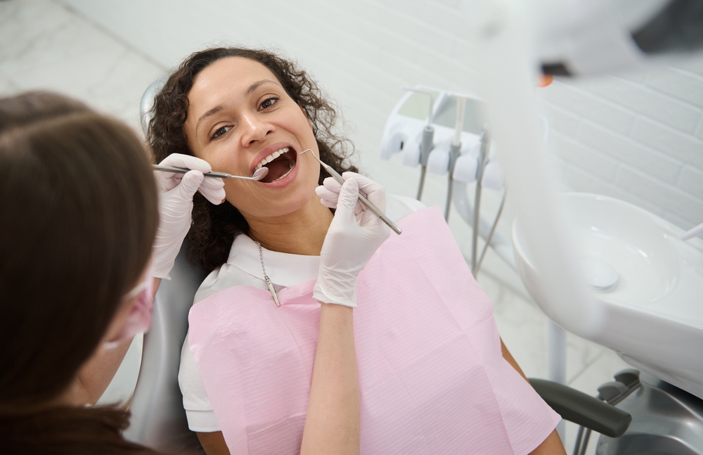 Patient receiving gentle dental care at Trend Dental Clinic